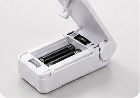 The open battery compartment of SnapSeal Mini